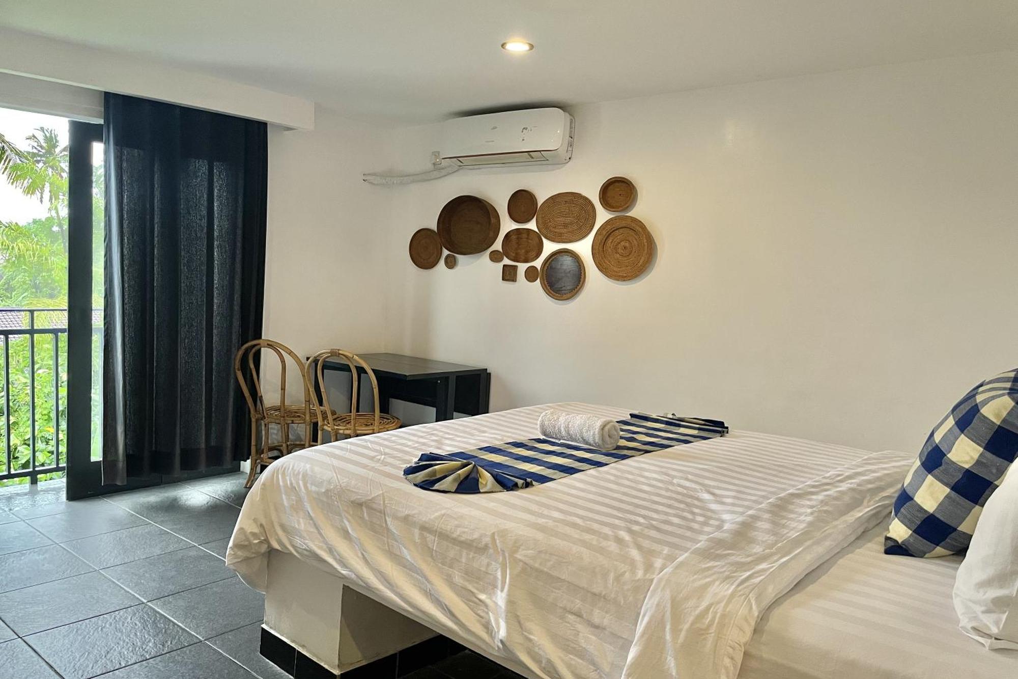 Taman Unique Hotel Сенгиги Екстериор снимка
