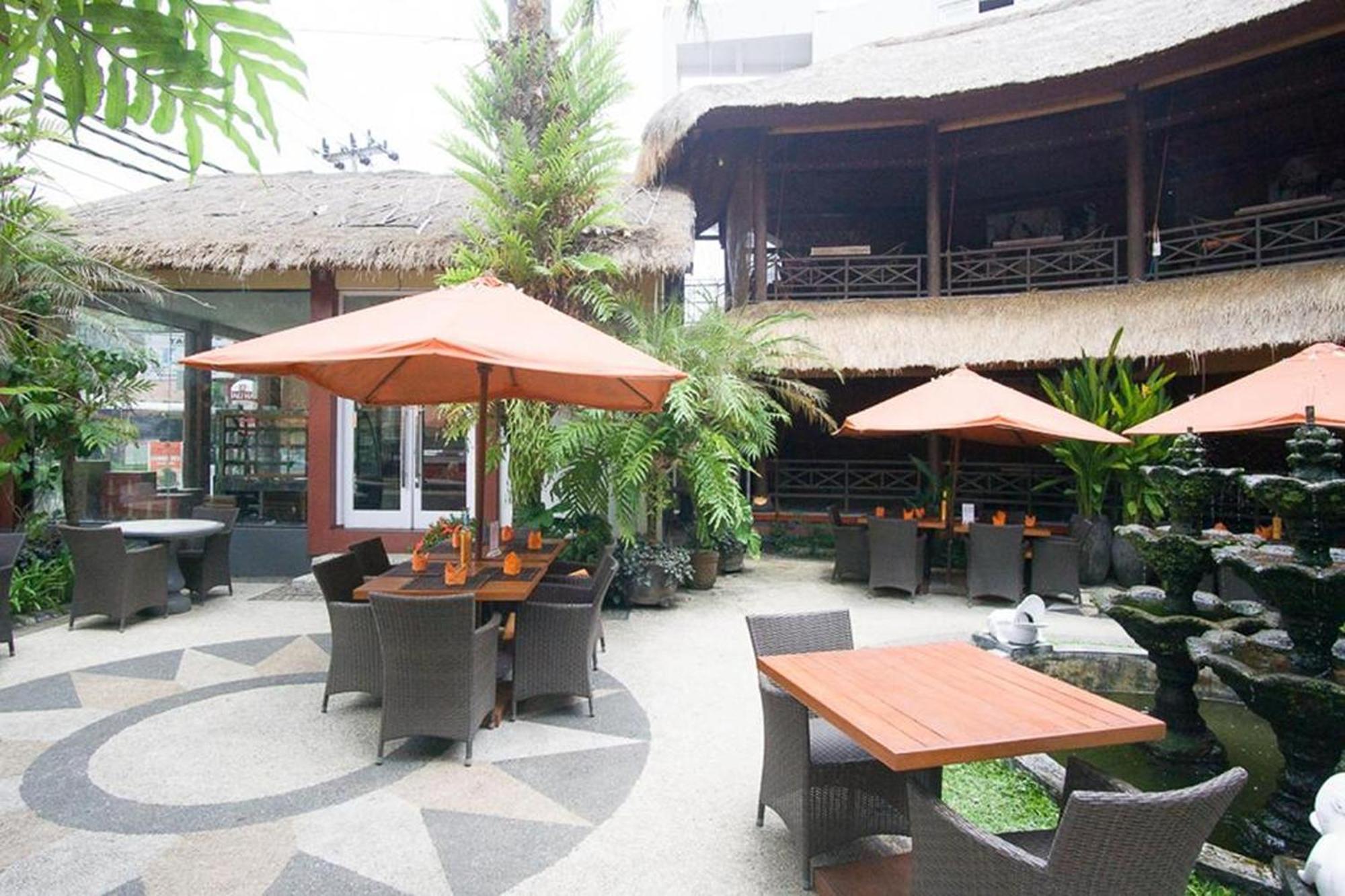 Taman Unique Hotel Сенгиги Екстериор снимка