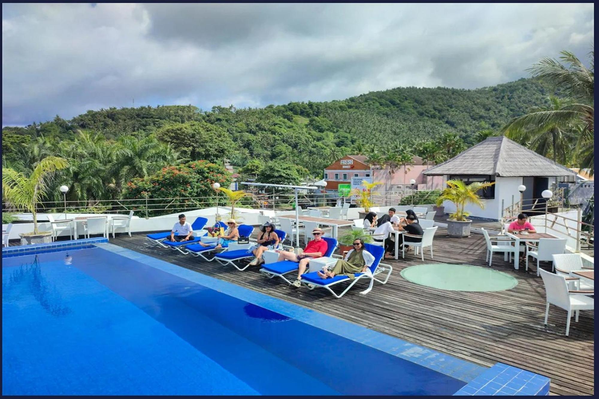 Taman Unique Hotel Сенгиги Екстериор снимка